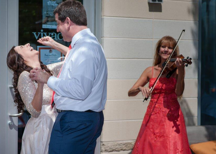 Genesisgroupphotography.com Christine Playing for happy couple